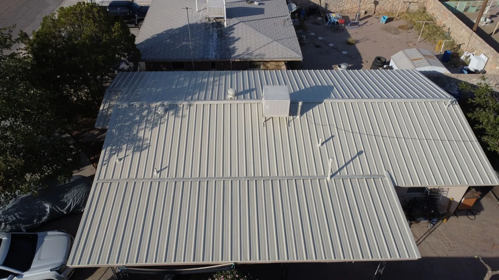 Drone view of the new roof flashed around a swamp cooler and vents
